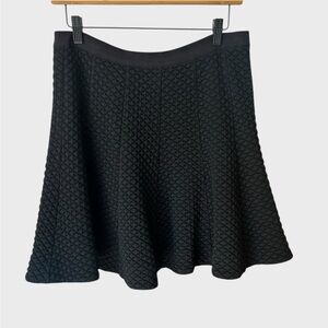 Rebecca Taylor black quilted textured flounced mini skirt.